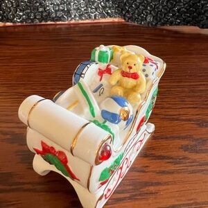 Avon porcelain holiday sleigh decoration or ornament